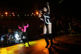 http://img155.imagevenue.com/loc1199/th_49490_celeb-city.org_Rihanna_Z100_Party_Plane_with_DKNY_JEANS_Performance_02-03-2008_024_123_1199lo.jpg