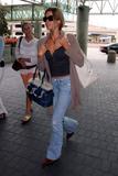 th_84153_Denise_Richards_arriving_at_LAX_airport_05.jpg