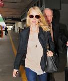 th_92076_NaomiWatts_ArrivesintoLAXAirportOct172011_By_oTTo1_122_502lo.jpg