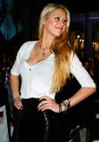 Anna Kournikova cleavagy and leggy in black leather mini skirt attends Destination Fashion 2009 in Miami - Hot Celebs Home