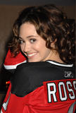 Emmy Rossum attends the Devils Arena opening night with New Jersey Devils NHL home opening game against the Ottawa Senators