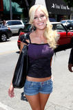 Heidi Montag leggy and busty in denim shorts and tight purple top arrives at Kitson on Robertson Blvd in Beverly Hills to help boost the Heidiwood clothing label at the popular designer store