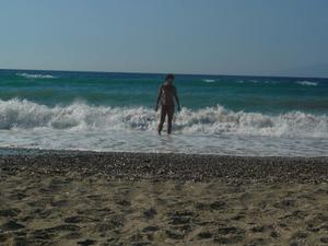 Unknown girl playing topless in Korfu beach Greece54evc09q1n.jpg